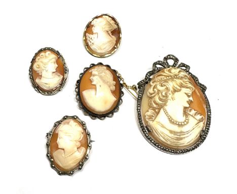 5 vintage silver framed cameo brooches largest measures approx 6cm by 4cm 1 cracked as shown 