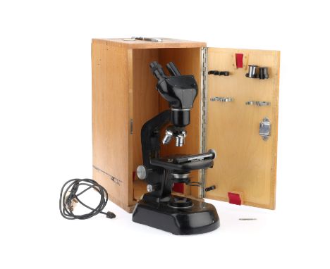 A Watson Binocular Microscope, black, G, lamp works, with three objectives, in wooden case, F.