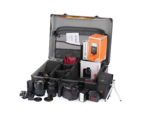 A Comprehensive Sony Alpha 77 Digital SLR Camera Outfit, to include a Sony α77 camera, serial number 5700725, body VG-E, func