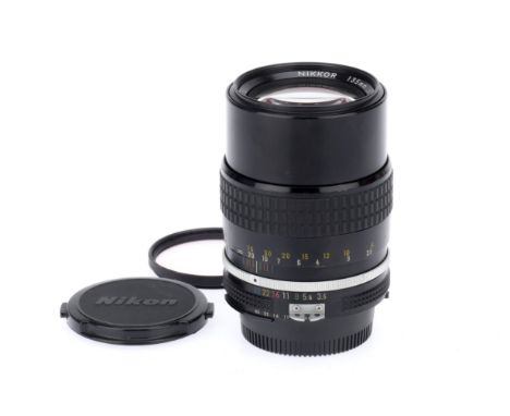 A Nikon Nikkor f/3.5 135mm Ai Prime Lens, black, serial number 221167, body VG, iris is snappy, optics VG, lightest of dust i