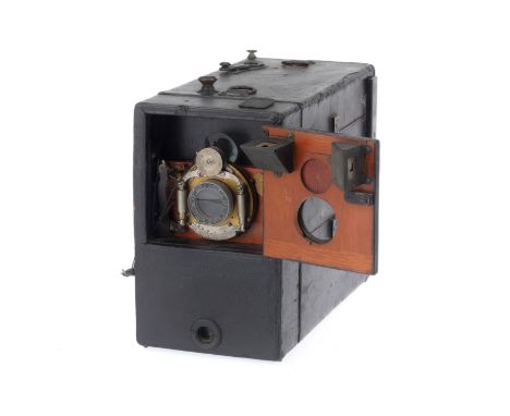 A Beck Telephoto Cornex Falling Plate Camera, black, leather covered, body F, the lens cover operates but does not latch firm