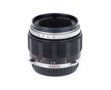 An Olympus f/3.5 38mm Auto Macro Lens for PEN Cameras, black, serial number 100880, barrel G, optics F-G, light haze and fung