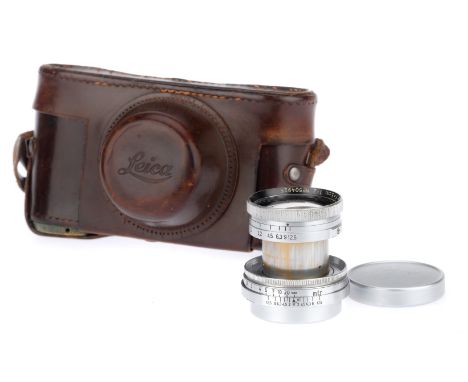 A Leitz Summitar f/2 50mm Lens, 1949, chrome, serial no. 504925, body, G-VG, elements, VG-E, some very light internal haze, c
