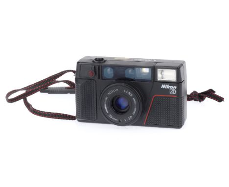 A Nikon AD 35mm Compact Camera, black, body G, does not power up, untested.