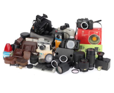 A Good Selection of Mixed Photographica, to include two Polaroid Swinger cameras, exposure meters, a Minolta 300si SLR, a Pat