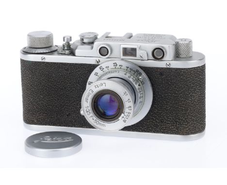 A Soviet 'Leica Luftwaffen-Eigentum' Rangefinder Camera, chrome, serial no. 325694, with 'Leitz Elmar' f/3.5 50mm lens, body,