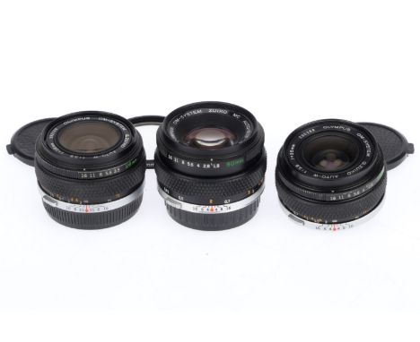 A Group of Olympus Zuiko Lenses, comprising an f/2.8 35mm, barrel VG, optics G, light haze, an f/1.8 50mm, barrel VG, optics 