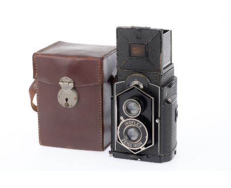 A Zeiss Ikon Ikoflex 850/16 "Coffee Can" TLR Camera, black, serial number Y11823, body G, some brassing around distance scale