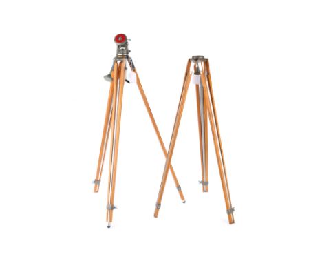A Pair of Wooden M.P.P. Tripods, light coloured wood and metal extending legs, one with a tilt and pan head, 80cm approx when