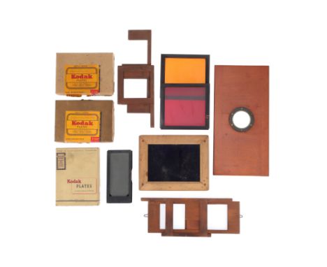 Selection of Large Format Camera Components, to include three wooden shuttters, needing attention, a lens board, a red and an