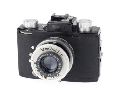 A Cornu Fama 1 35mm Camera, black, body G, with Som Berthiot f/2.8 50mm lens, shutter works, advance seems jammed, iris works