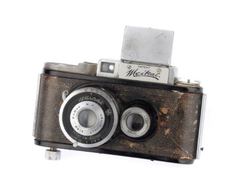A Tougodo Meikai-Ref TLR Camera, black/chrome, with compass, serial no. 5596, with M.K. Anastigmat f/4.5 50mm lens, body, P-F