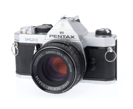 A Pentax MX 35mm Camera, silver, serial number 4214854, body G, shutter works, metering responds to light, viewfinder display