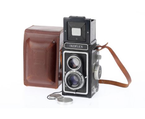 A Zeiss Ikon Ikoflex Ia TLR Camera, black, serial number 735766, body G, shutter works, iris works, focusses, with Zeiss-Opto