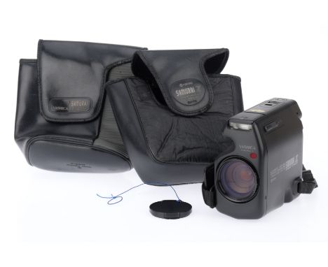 A Yashica Kyocera Samurai Z Half Frame Automatic Camera, black, serial number 069849, body VG, battery tested, powers up, tak