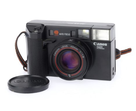 A Canon ML 35mm Auto Focus Compact Camera, black, body G, powers up, takes a picture and advances with battery inserted, flas