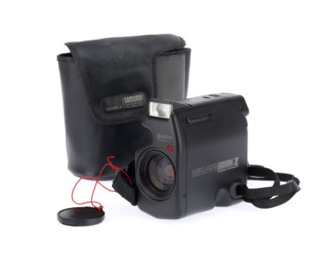 A Yashica Kyocera Samurai Z Half Frame Automatic Camera, black, serial number 005399, body VG, battery tested, powers up, tak