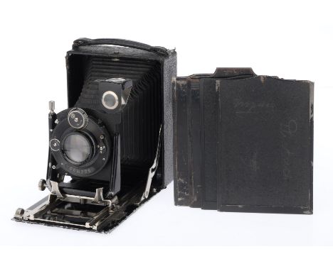 A 9x12cm Folding Plate Camera, black, body F-G, ground glass intact but taped in place, extends and folds, not light tested, 