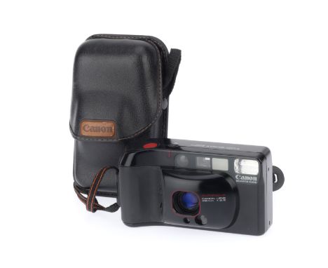 A Canon Top Shot Autofocus Compact Camera, black, body G, f/2.8 38mm, battery tested, powers up, takes a picture, flash works