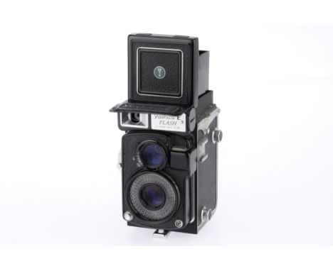 A Yashica E-Flash TLR Camera, black, serial number YE4011967, body G, shutter operates intermittently, selenium cell not conf