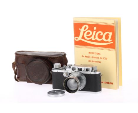 A Leica IIIb 35mm Rangefinder Camera, chrome, serial number 351346, body G, light marks to the bottom plate, shutter works, r
