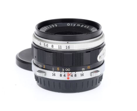 An Olympus Zuiko Auto-W f/4 28mm Lens, black, serial number 101399, barrel VG, optics VG with very light dust, with caps.