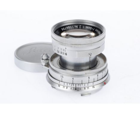 A Leitz Wetzlar Summicron f/2 5cm Lens silver, serial number1144798, barrel G, focus action sticks and difficult to move smoo