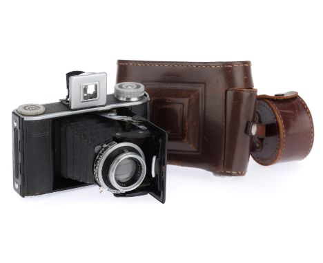 A Voigtlander Bessa 66 Folding Camera, black, body G, shutter works but slow at 1 second, extends and folds correctly, with V