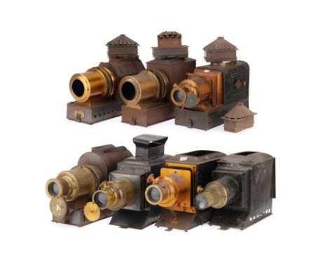 A Large Collection of Magic Lantern Bodies, all brass and tinplate, including 5 with lenses, 2 missing optics, all missing il