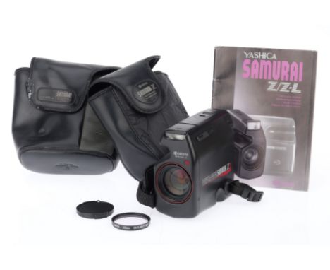 A Yashica Kyocera Samurai Z2 Half Frame Automatic Camera, black, serial number 137765, body VG, battery tested, powers up, ta