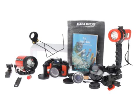 A Comprehensive Nikonos V Camera Outfit to include the Nikonos, black/orange, VG controls work, shutter works, fitted with f/