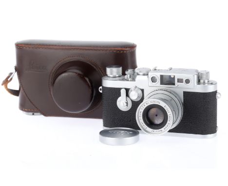 A Leitz Wetzlar Leica IIIg Rangefinder Camera, silver, serial number 968864, body VG, shutter high speeds seem good, low spee