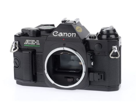 A Canon AE-1 Program 35mm Camera Body, black, serial number 3673886, body VG, shutter works, meter responds to light, viewfin