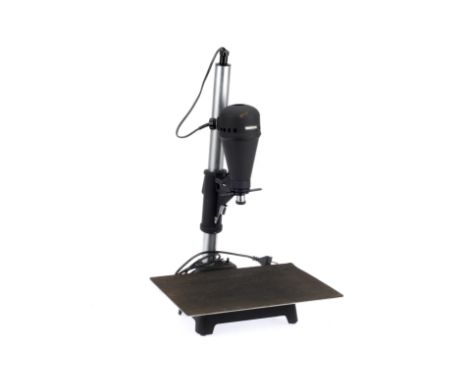 A Minox Model 2540 Enlarger for Minox 8x11mm Negatives, black lamp unit, condition G, not electrically tested, has a North Eu