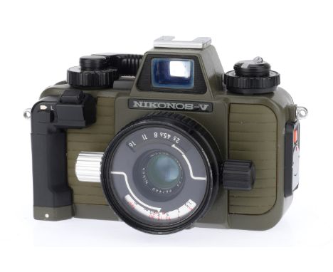 A Nikonos V Underwater SLR Camera, Green, serial number 2114731, body VG, shutter works, battery tested, viewfinder display w