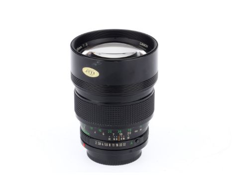 A Canon FD f/2 135mm Lens, black, serial no. 25978, body, VG-E, elements, VG, some very light internal haze