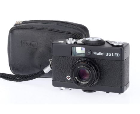 A Rollei 35 LED Compact 35mm Camera, black, body G, shutter works, advance works, with Rollei Triotar f/3.5 40mm lens, optics