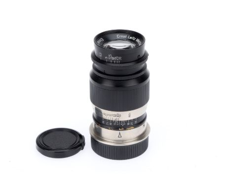 A Leitz Wetzlar Elmar f/4 9cm Lens, black/chrome, serial number 516604, barrel G, iris action and focus action smooth, optics