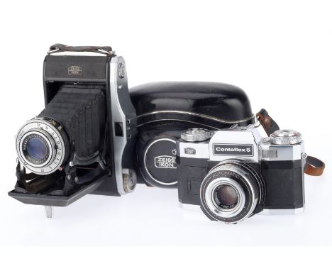 A Pair of Zeiss Ikon Cameras, comprising a Nettar 517/2, black, serial number U56013, body G, bellows extends correctly, Pron