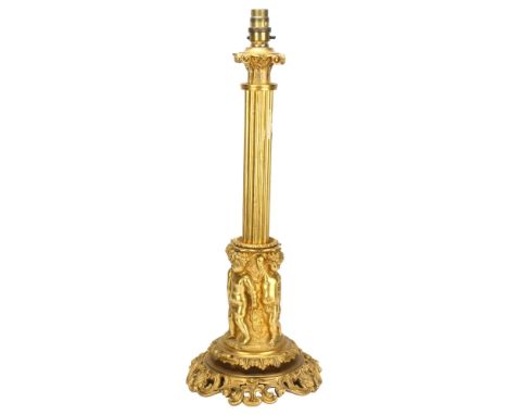 A large ormolu Corinthian column table lamp, with relief putti support and foliate base, height excluding fitting 48cmNo dama