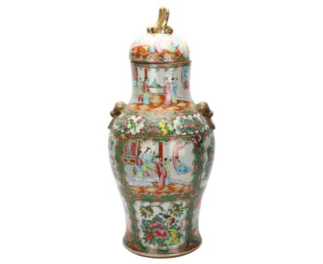 A Chinese Canton famille rose vase and cover, with hand painted and enamelled figures in courtyard and bird in blossom, with 