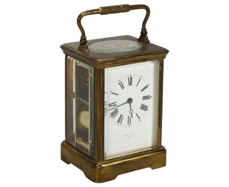 A 19th century French brass-cased carriage clock, by Hall & Co of Paris, white enamel dial with Roman numeral hour markers an