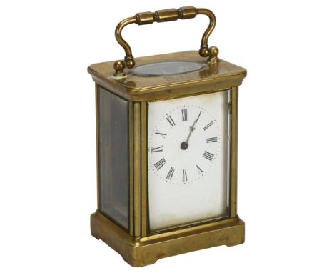 A 19th century brass-cased carriage clock, white enamel dial with Roman numeral hour markers, case height 11cm, working order