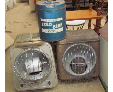 Two radiant oil heaters together with an Esso Blue paraffin tin