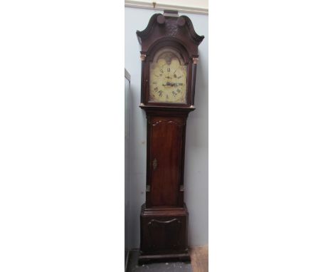 A 19th century mahogany long case clock, with a shaped hood and corinthian columns above a long trunk door, box base and brac