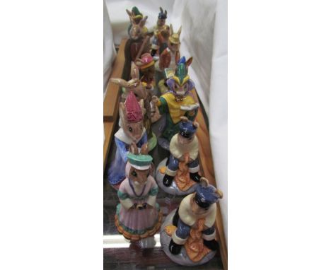 A collection of Royal Doulton Bunnykins figures including Maid Marion Bunnykins, Sundial Bunnykins, Friar Tuck, Boy Skater, F