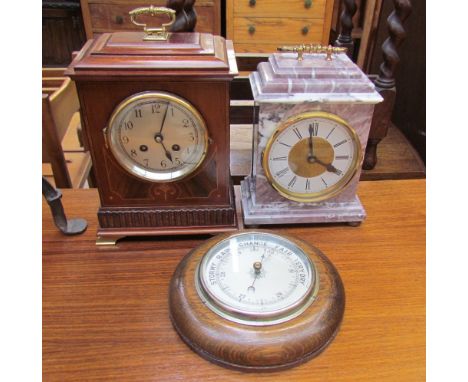 An Edwardian mahogany mantle clock, with a brass carrying handle, silvered dial and Arabic numerals striking on a gong, toget