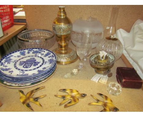 A brass oil lamp together with assorted plates etc