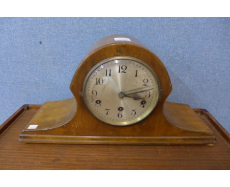 An early 20th Century walnut mantel clock 