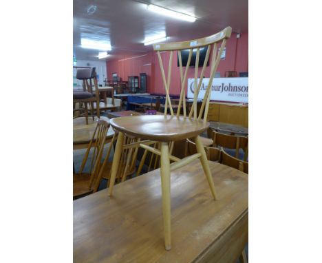 An Ercol Blonde elm and beech Chiltern candlestick chair 